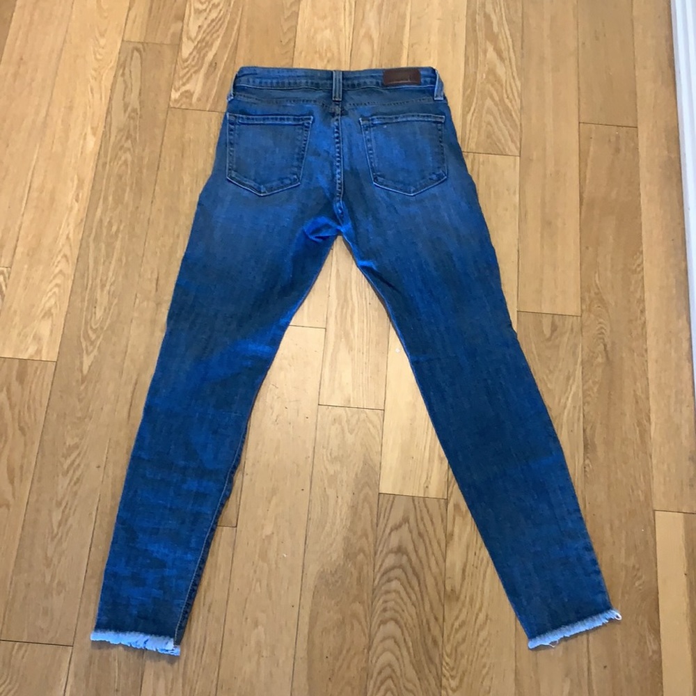 Medium wash jeans with distressed look - Picture 2 of 3